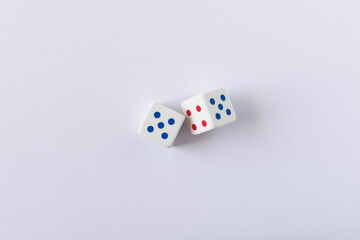 Dice on the light background. Close up. The concept of good luck in gambling.