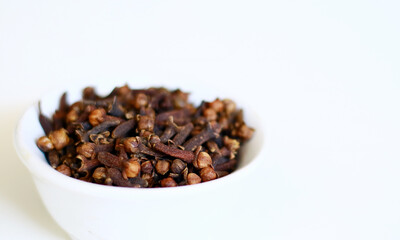 Dried cloves on white background. 
