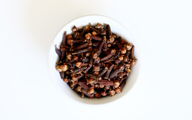 Dried cloves on white background. 