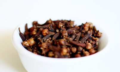 Dried cloves on white background. 