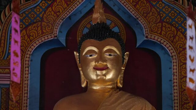 Golden buddha image in time in thailand.
