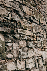 An old stone medieval wall, a natural background, a replica of the cosmos.
