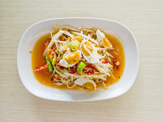 Papaya salad with salted eggs