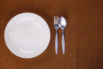 Empty white plate and kitchenware