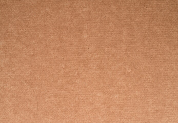 Fototapeta na wymiar Cardboard paper texture, brown carton material surface