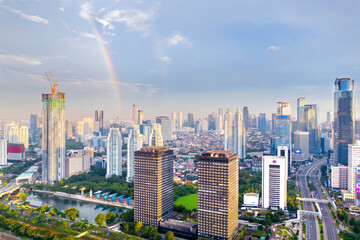 Beautiful rainbow on the Jakarta city sky