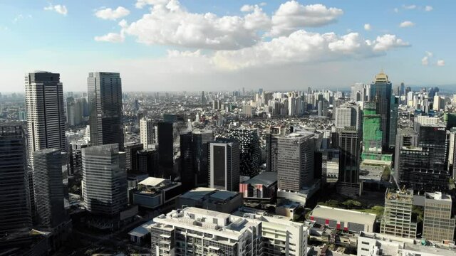 The Most Epic View of Manila Skyline. Flying Above Bonifacio Global City, Taguig, Philippines.