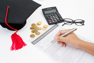 Male student filling an education insurance policy