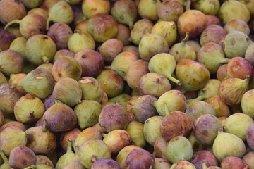 fig fruits, a sweet, soft, purple or green fruits at road side