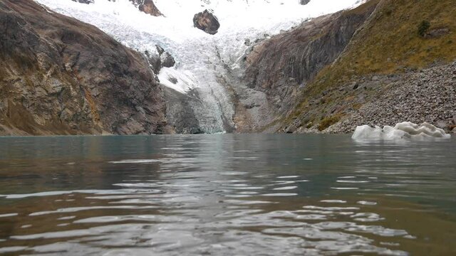 Water of the lake arhuaycocha, global warming effect, glacier water, peru, the andes