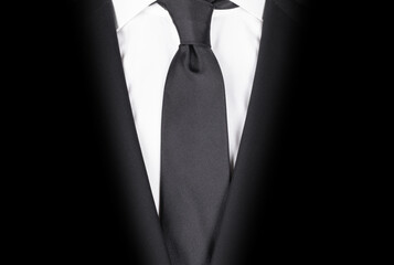 Man in a black suit, close-up