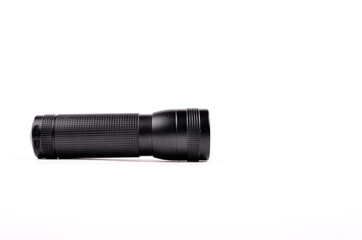 Black flashlight isolated on a white background
