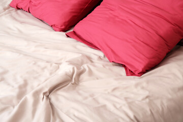 Big comfortable bed in room, closeup