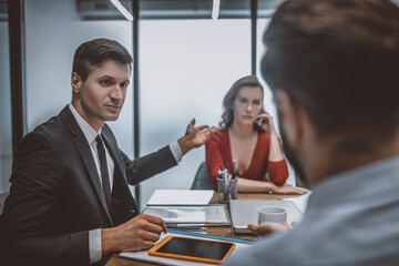 Lawyer discussing with a man divorce reasons