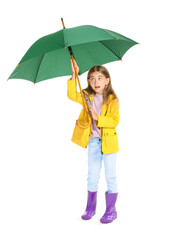 Cute little girl in raincoat and with umbrella on white background