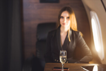 Attractive woman in private jet