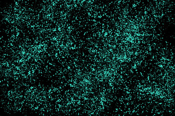 Blue watercolor brushed particles pattern on black
