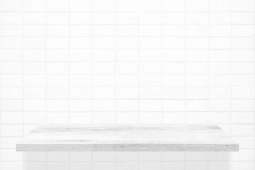 White Wooden Shelf on Mosaic Tile Wall Texture Background.