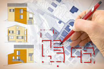 Architect drawing a new residential building over an imaginary cadastral map of territory