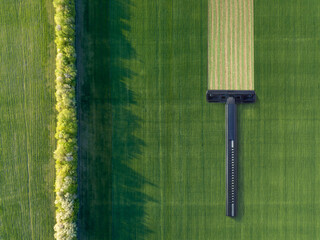 Green field with disposable shaving machine.