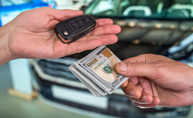 businessman buys a new car