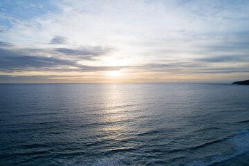 Sunset over sea Beautiful light of nature image by Drone camera.