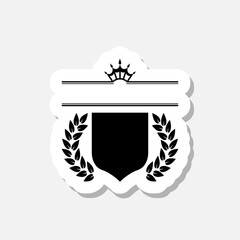 Shield with crown and laurel sticker isolated on gray background