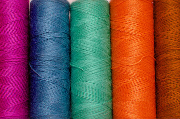 Multicolor sewing thread roll background