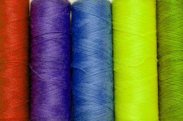 Multicolor sewing thread roll background