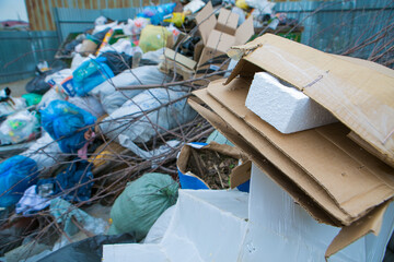 pile of waste in a container. garbage collapse. Janitors ' strike. environmental disaster of plastic recycling
