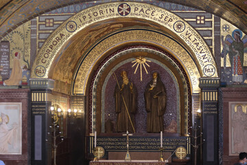 Cassino, Italy - July 5, 2020: The central chapel with the statues of San Benedetto and Santa Scolastica in the basilica of Montecassino - obrazy, fototapety, plakaty