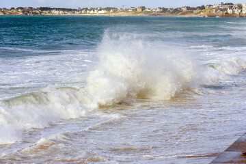 Big high tide and big waves on the Chaussée du Sillon in Saint Malo, Brittany, France