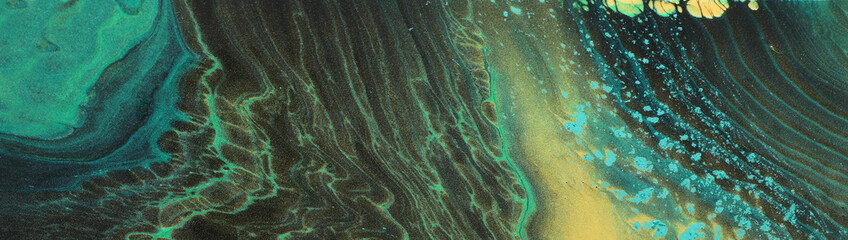 art photography of abstract marbleized effect background. Gold and balck, green creative colors. Beautiful paint.