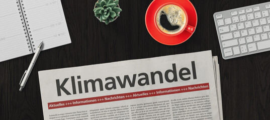 Zeitung auf Schreibtisch - Klimawandel