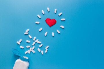 Pills,tablets and red heart. Cardiology and medicine, pharmacy concept