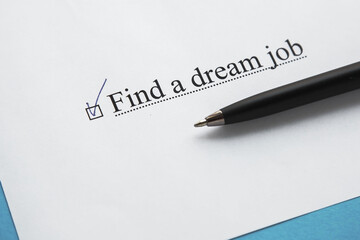 a piece of paper with the inscription find a dream job from to do list with a tick