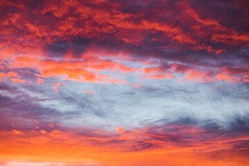 City skyline on vivid abstract sunset sky background