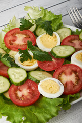 healthy food, cabbage salad with tomatoes, egg and cheese.