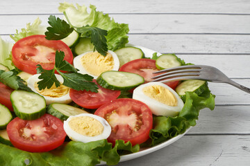 healthy food, cabbage salad with tomatoes, egg and cheese.