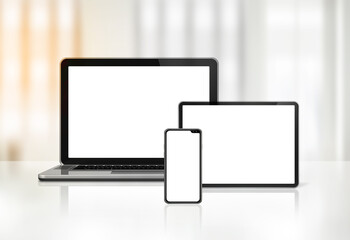 Laptop, mobile phone and digital tablet pc on office desk
