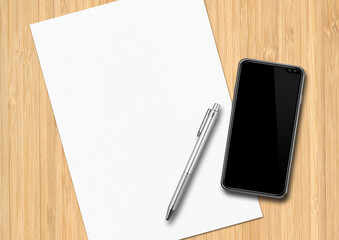 Sheet of paper, pen and smartphone on a wooden desk