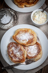 Polish pancakes with powdered sugar.