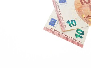 Paper money of the euro on a white background neatly laid out, straight, smooth. Denomination twenty, ten, fifty, five euros. Savings. Saving. Credit. Spare pillow for a rainy day.
