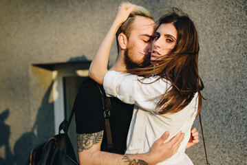 Beautiful young couple have fun. Her happiness is everything to him.