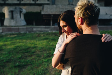 Beautiful young couple have fun. Her happiness is everything to him.