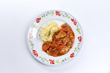 meat with mashed potato and vegetables