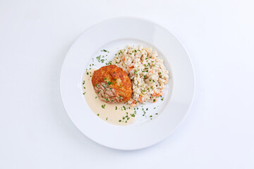 cutlet with barley on the white