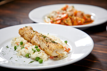 chicken kebab with rice and vegetables on the wooden background
