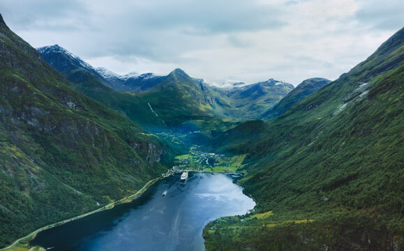 Geiranger fjord aerial view mountains landscape in Norway ships sailing travel scenery famous natural landmarks summer season © EVERST