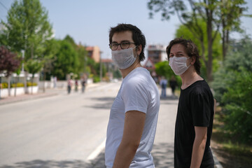 Walking with friends in coronavirus epidemic days at the park.